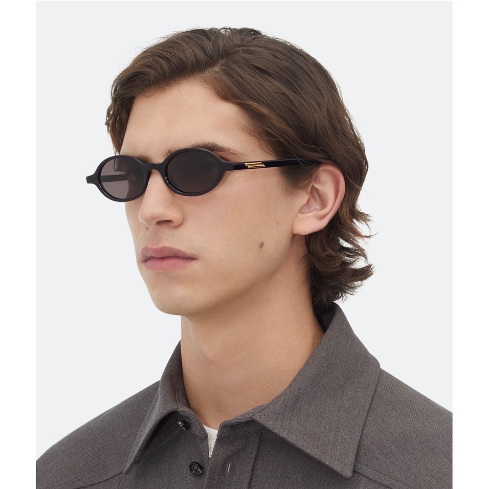 Bottega Veneta BV1143S 001 Black Oval Sunglasses with Gold Ribbon Detail